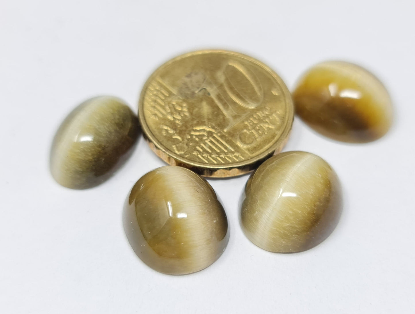 Nr.157 Chrysoberyll Katzenauge, verschiedene Varianten, oval, Tropfen, rund, beige, grün, gelb, rot