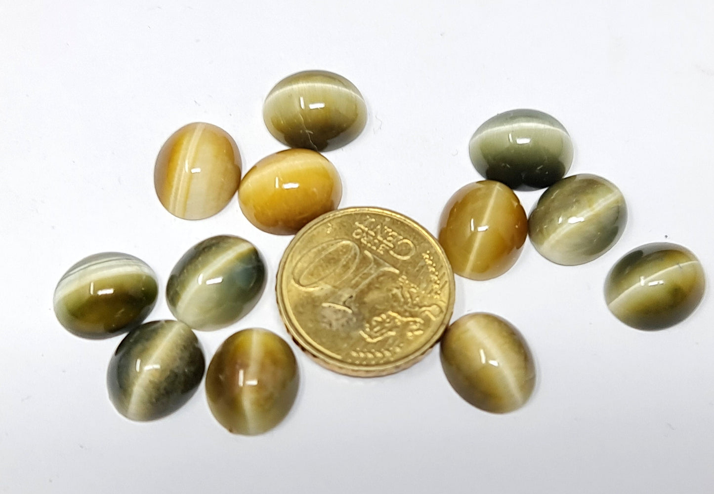 Nr.157 Chrysoberyll Katzenauge, verschiedene Varianten, oval, Tropfen, rund, beige, grün, gelb, rot