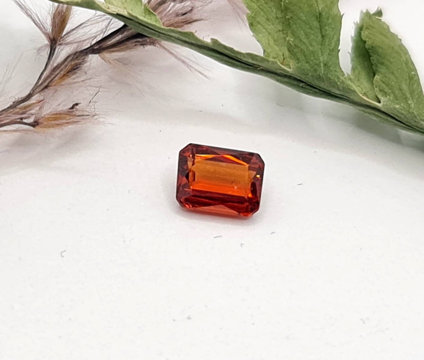 Mandaringranat rechteckig facettiert orange 5,7x4,3mm 0,91ct (Nr.475)