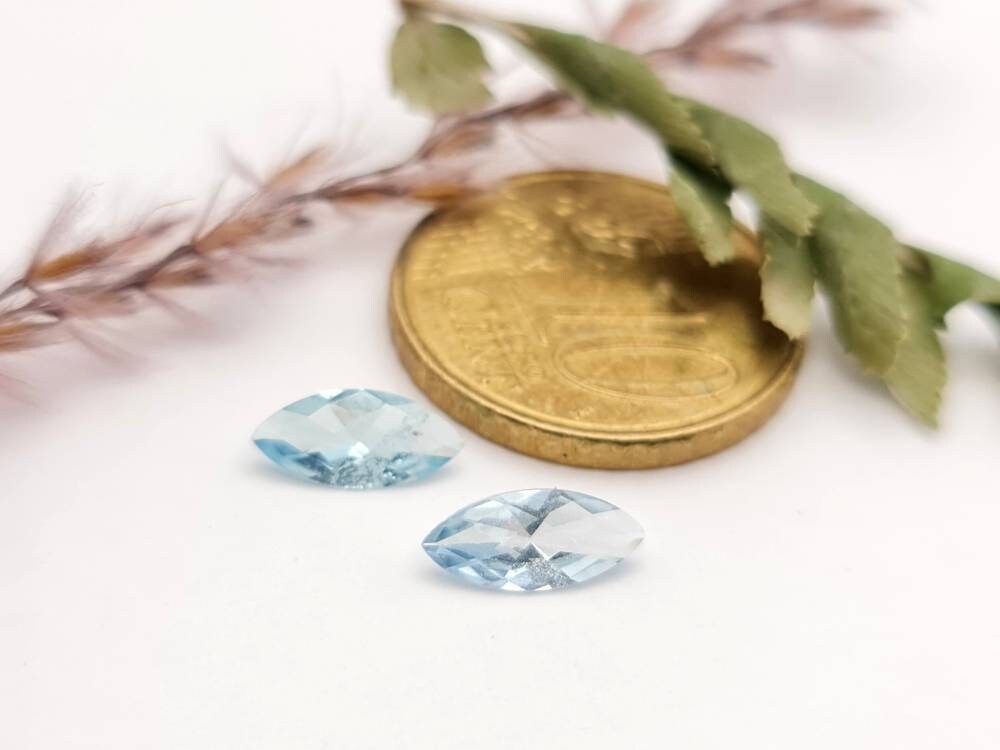 Ein Paar Aquamarine navette facettiert, feines Blau 9,3x4,2mm 1,06ct (Nr.1165)