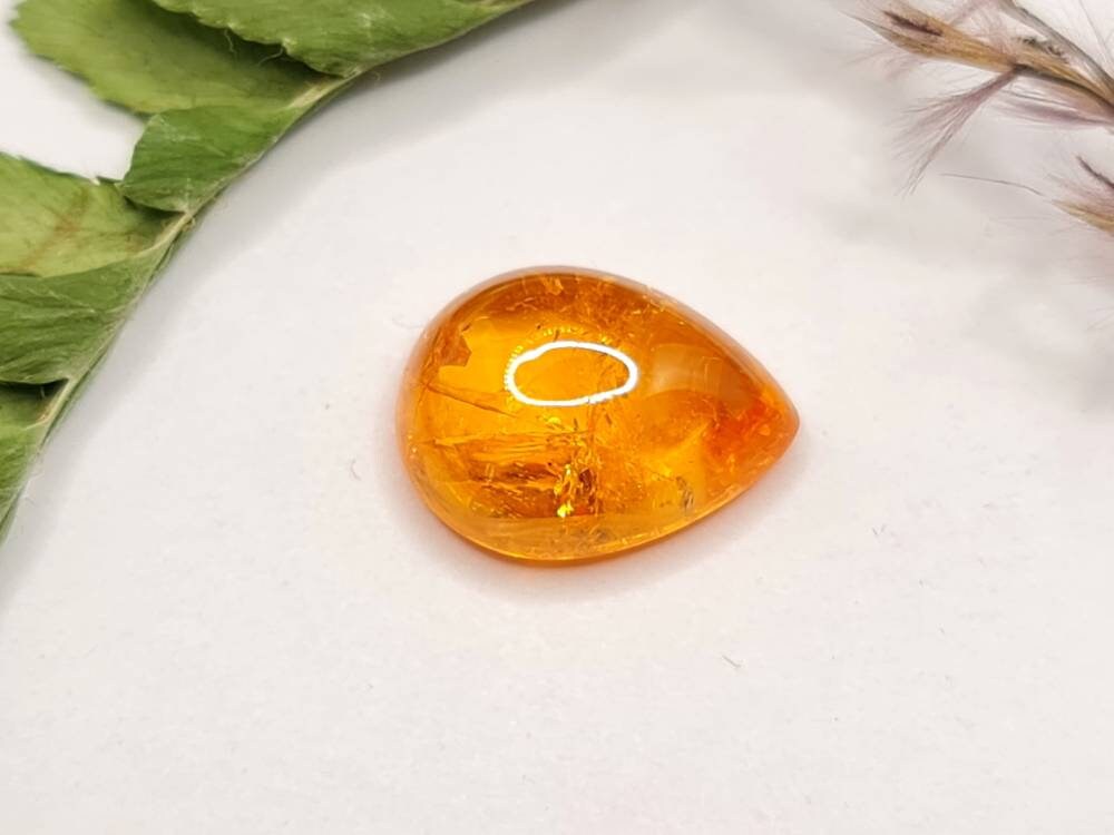 Nr.211 Mandaringranat Cabochon Tropfen, Träne orange 12,4x9,7mm 6,57ct