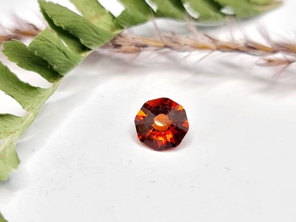 Facettierter Mandaringranat (Spessartin), rund und orange 7mm 1,6ct (Nr.258)