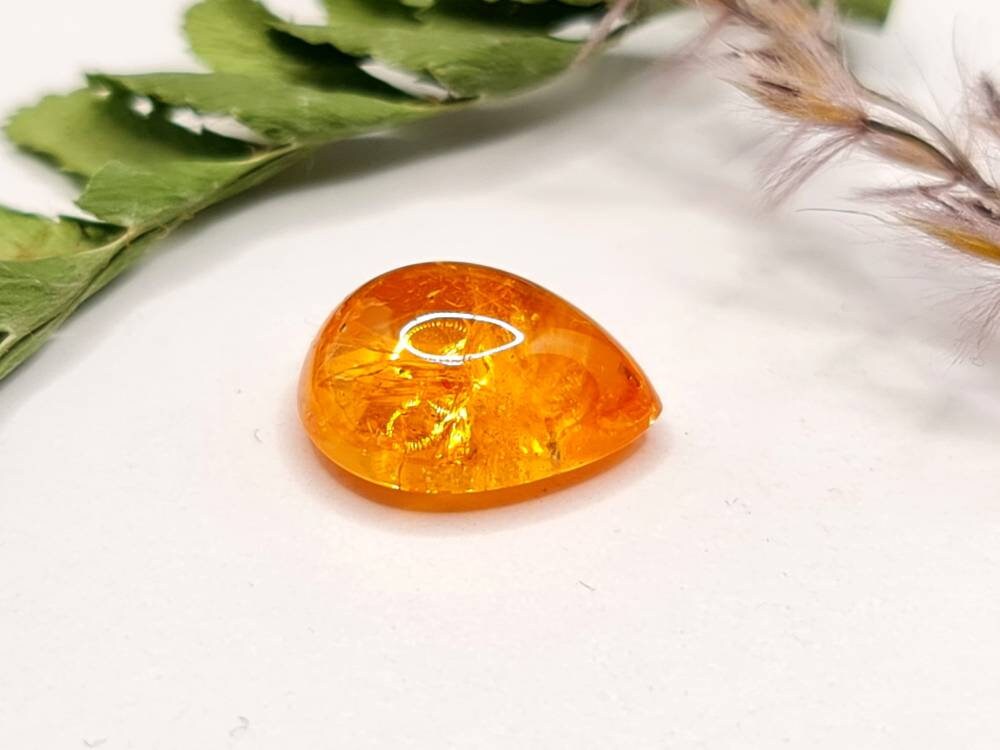 Nr.211 Mandaringranat Cabochon Tropfen, Träne orange 12,4x9,7mm 6,57ct