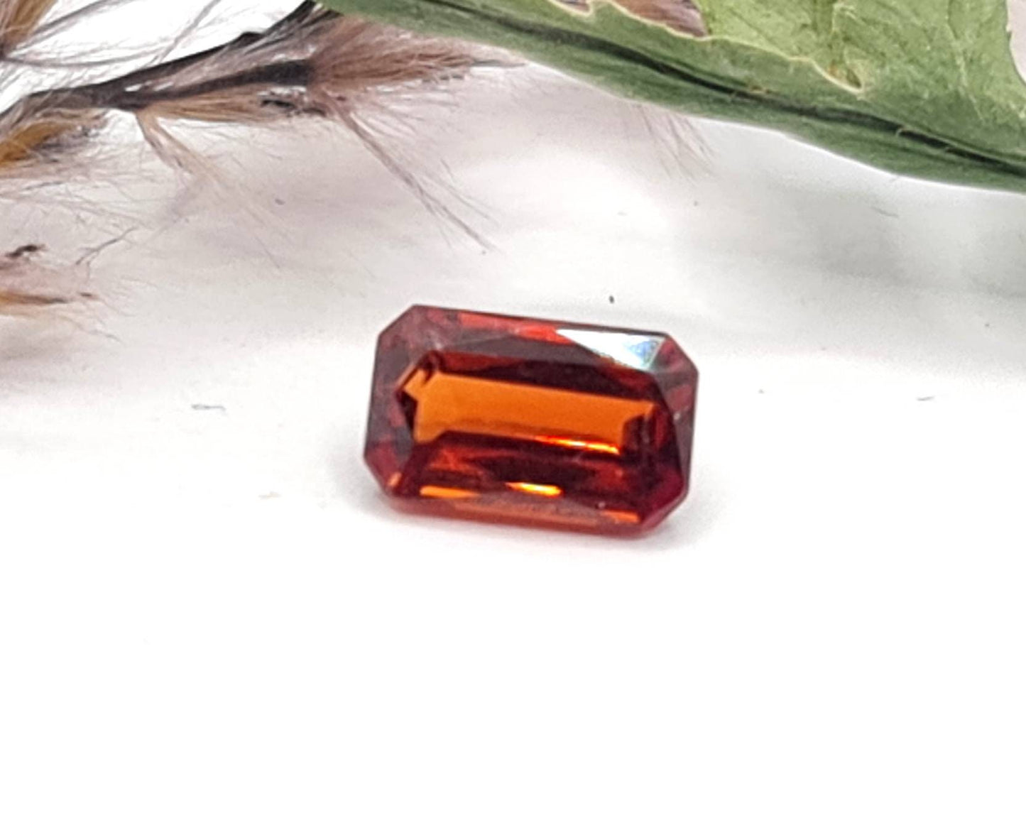 Rechteckig facettierter Mandaringranat orange 6,6x4mm 0,97ct (Nr.477)