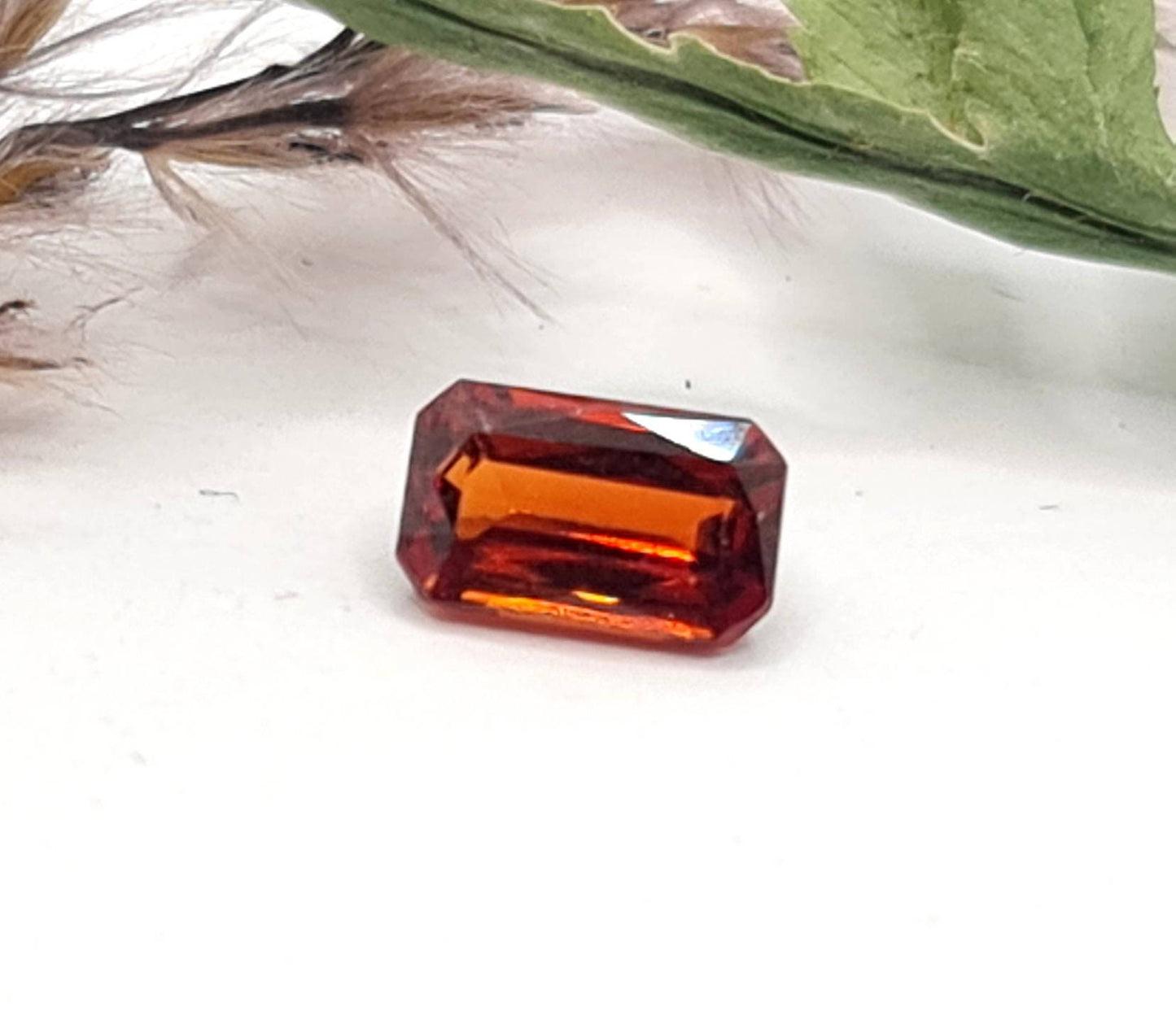 Rechteckig facettierter Mandaringranat orange 6,6x4mm 0,97ct (Nr.477)