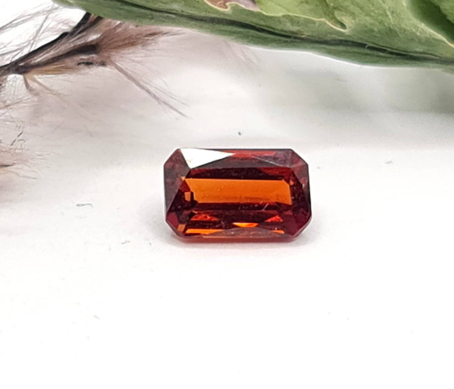 Rechteckig facettierter Mandaringranat orange 6,6x4mm 0,97ct (Nr.477)