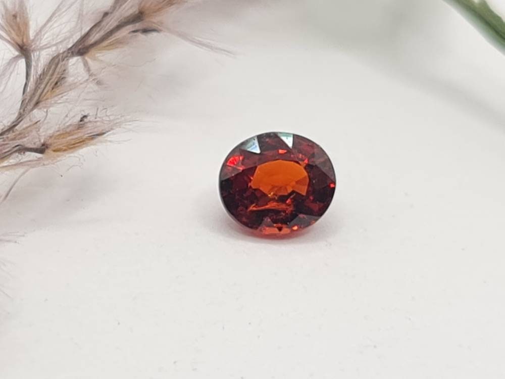 Mandaringranat oval facettiert orange 5,6x4,9mm 0,93ct (Nr.478)