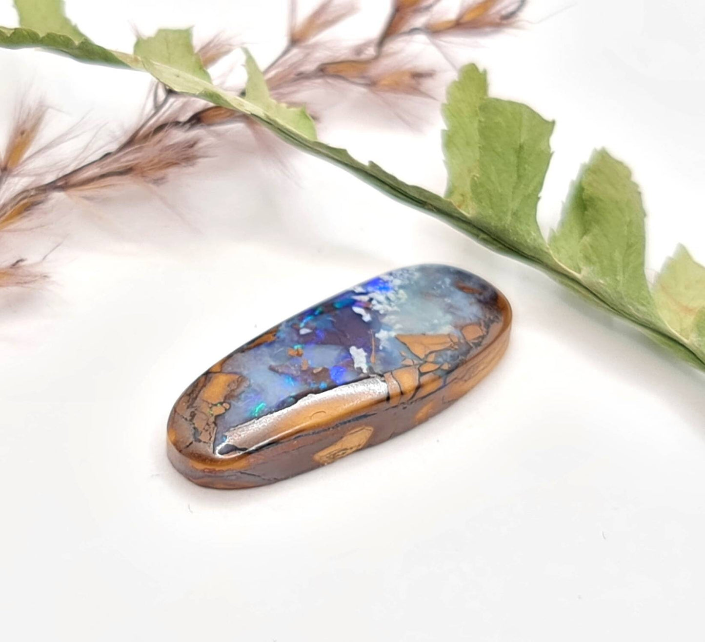 Feiner türkisblauer Boulderopal 20x7,8mm 5,19ct (Nr.621)